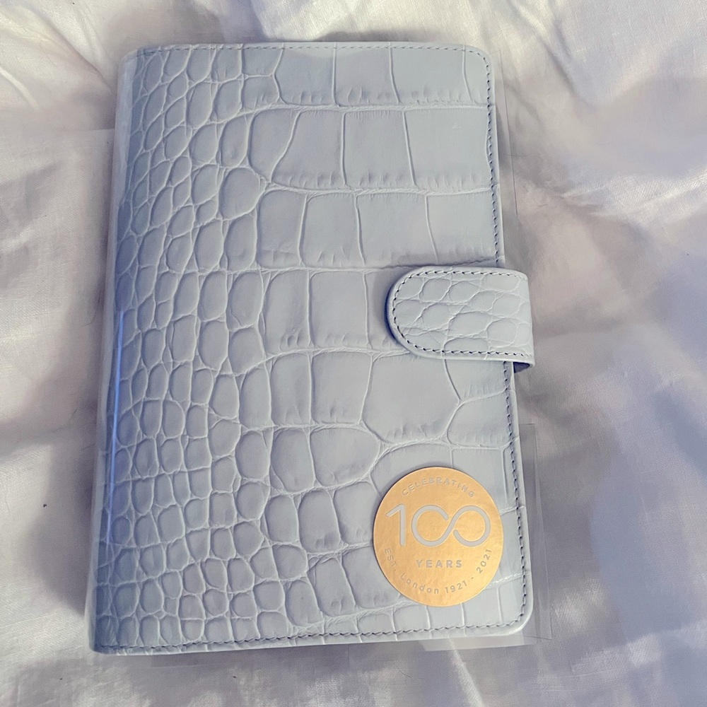 Filofax personal planner binder.